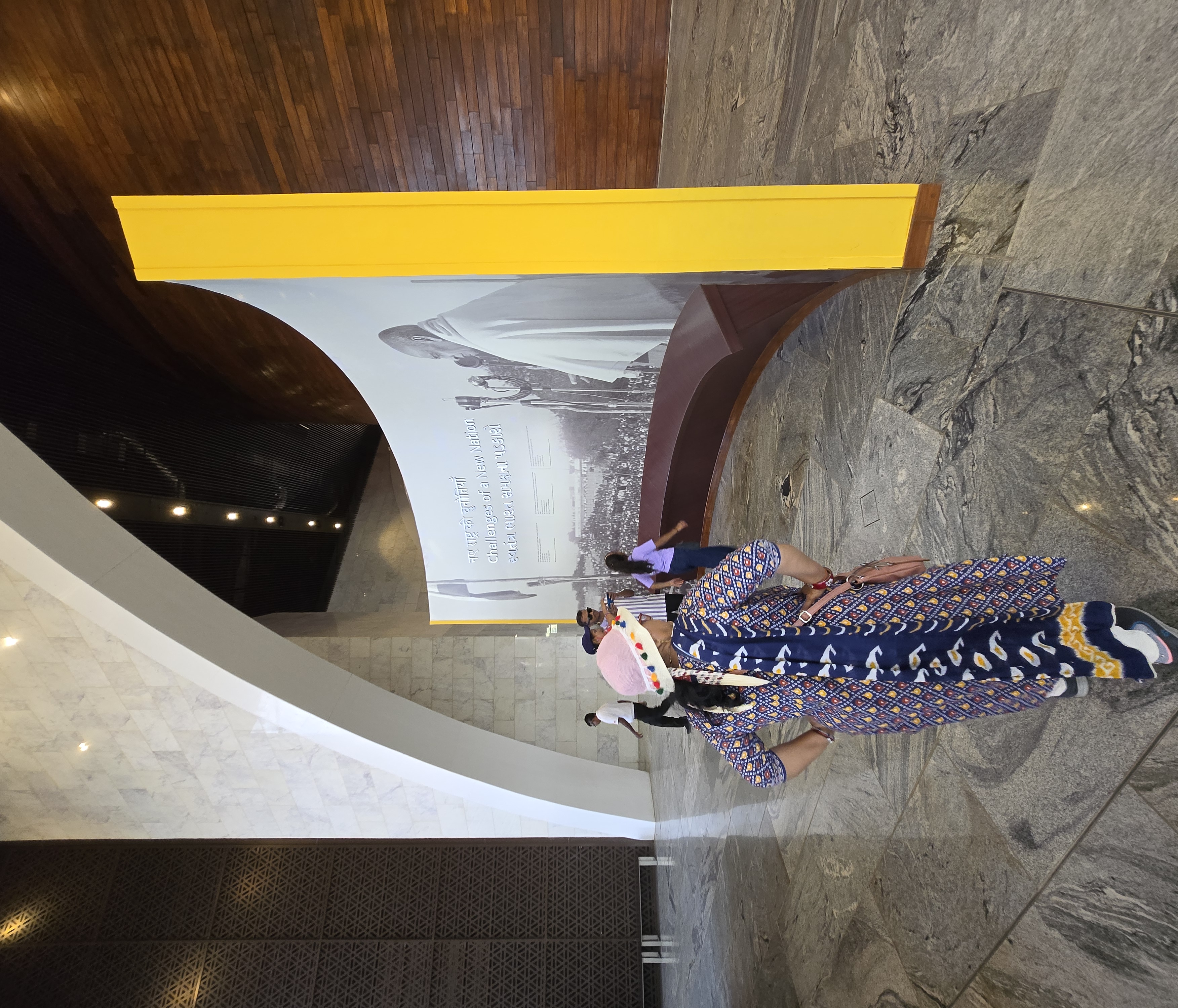 Visitor walking toward the Challenges of a New Nation exhibit inside the Statue of Unity museum
